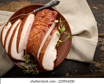 Smoked Chicken Meat On Wooden Table