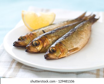 Smoked Fish (herring Or Sardine) On Plate, Selective Focus