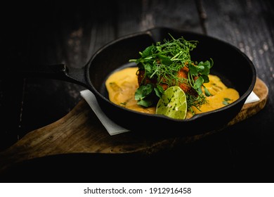 Smoked Haddock And Chive Fishcakes Served With Mixed Baby Leaf Salad And Creamed Cheesy Leek Sauce