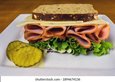 Smoked  Ham Sandwich With Lettuce And Top With Swiss Cheese