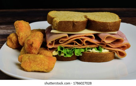 Smoked Ham Sandwich With Veggie Tots.