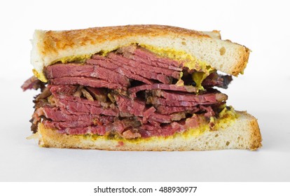 Smoked meat beef sandwich with mustard and black pepper corns, isolated on white
