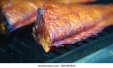 Smoked Perch Fish In Smokehouse On The Grate.