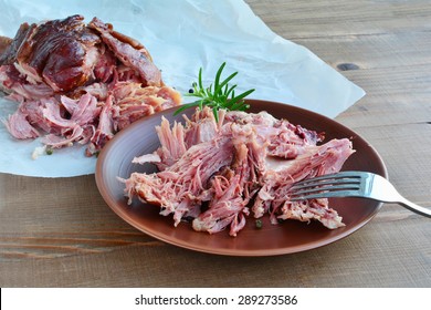 Smoked Pulled Pork In Plate Over Wooden Table.
