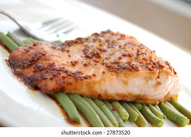 Smoked Salmon Fillet With Honey Mustard Sauce On A Bed Of Green Beans