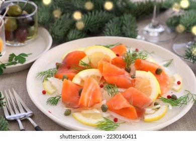 Smoked salmon salad with sliced onion ,lemon,dill and capers  - Powered by Shutterstock