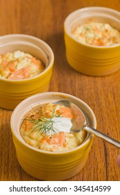 Smoked Salmon Souffle In Yellow Cup With Spoon