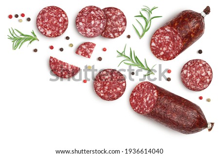 Smoked sausage salami with slices isolated on white background with clipping path. Top view with copy space for your text. Flat lay