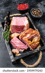 Smoked Sliced Pork Slab Bacon Meat In A Wooden Tray. Black Background. Top View