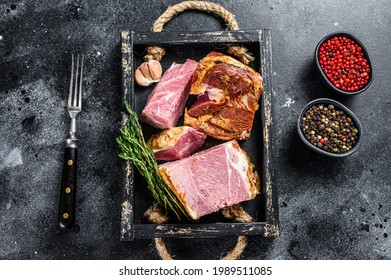 Smoked Sliced Pork Slab Bacon Meat In A Wooden Tray. Black Background. Top View