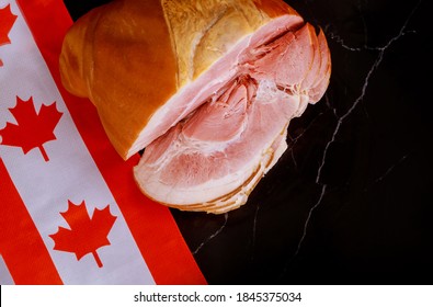 Smoked Whole Ham In Bone With Canadian Flag.