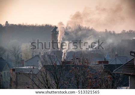 Smoking chimneys in city
