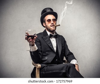 smoking elegant man - Powered by Shutterstock