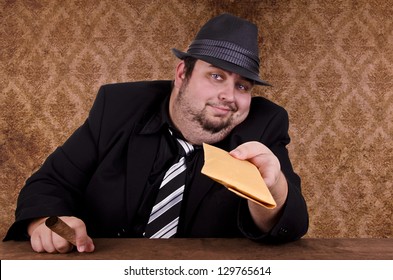 Smoking Gangster Holding Brown Envelope, Close Up.