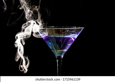 Smoking Martini Glass With Purple Drink. 