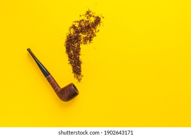 Smoking Pipe With Tobacco Form Plume Of Smoke. Isolated Flat Lay Concept On Yellow Background. Copy Space, Place For Text