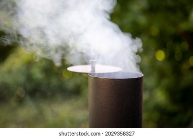 Smoky Grill Chimney. White Smoke. Eat Cooking And Holidays.