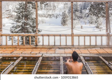 Smoky Outdoor Onsen (Hot Spring) With Snow In Winter At A Ryokan Of Zao Hot Spring, Yamagata , Japan 