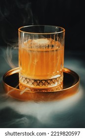 Smoky Whiskey Sour Cocktail With Square Ice Cube