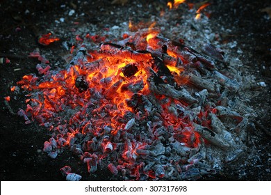 Smoldering Ashes Of A Bonfire.