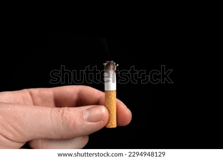 Similar – smoking time. Smoking Hand