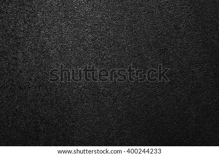 Smooth asphalt road. The texture of the tarmac, top view.