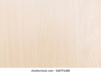 Smooth birch wood texture on table top view white light beige color background. Plain plywood clear wooden grain pastel teak oak. Seamless clean beech board marble bacground shot.