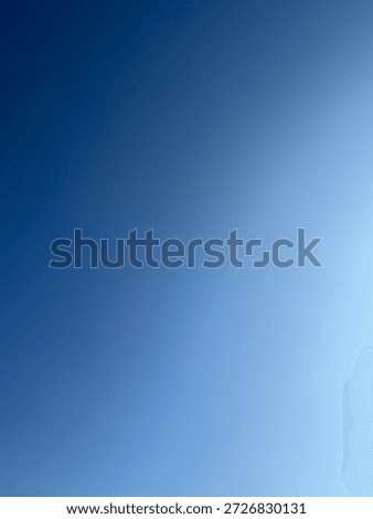 Smooth blue gradient sky with soft color transition.