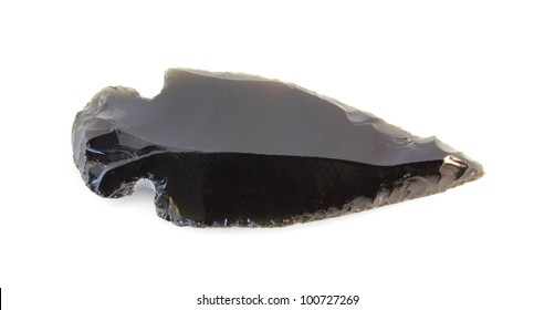 A smooth, chiseled, Native American Indian arrowhead isolated on white.
