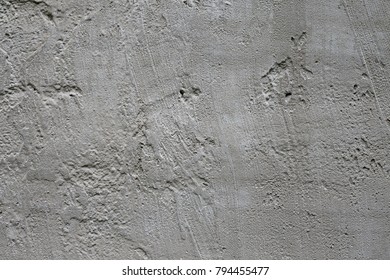 Smooth concrete texture. Beton uneven texture. Photographic pattern. Cement concrete surface. Creme gray rabblework superficies. Concrete superficial area. Concrete wallpaper, background image.
