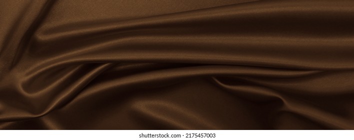 Smooth Elegant Brown Silk Or Satin Texture Can Use As Abstract Background. Luxurious Background Design Wallpaper. In Sepia Toned. Retro Style