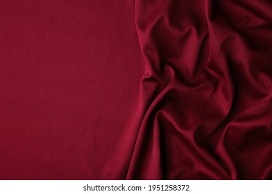 Smooth Elegant Burgundy Silk Or Satin Luxury Cloth Texture Can Use As Abstract Background. Luxurious Background Design. Top View