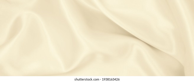  Smooth elegant golden silk or satin luxury cloth texture can use as wedding background. Luxurious background design. In Sepia toned. Retro style