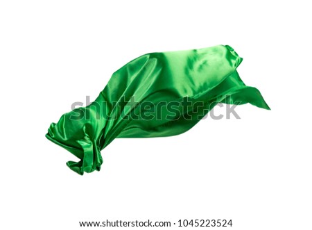 Smooth elegant transparent green cloth isolated or separated on white studio background. Texture of flying fabric.