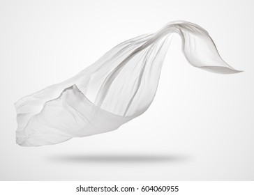 Smooth Elegant Transparent White Cloth Separated On Gray Background. Texture Of Flying Fabric.