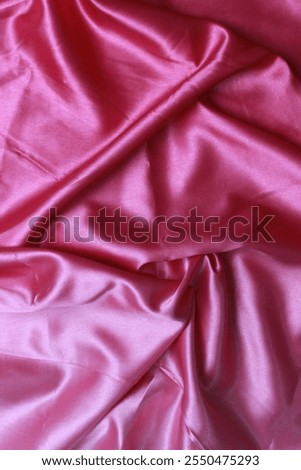 Smooth elegant wavy deep black silk cloth fabric material texture. Background for banner, backdrop or texture for 3D mapping. Satin luxury cloth texture can use as abstract background
