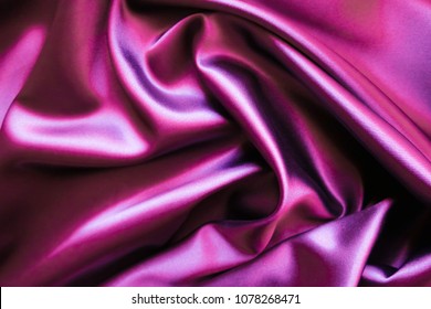 Smooth Elegant Wavy Hot Magenta Pink Satin Silk Luxury Cloth Fabric Texture, Abstract Background Design.