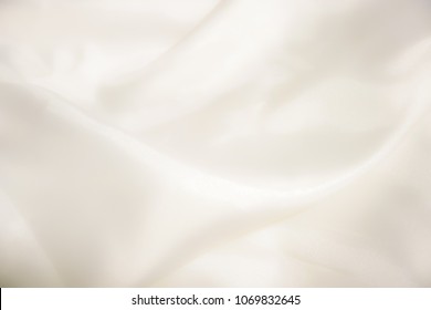 Smooth elegant white silk or satin luxury cloth texture can use as wedding background. - Shutterstock ID 1069832645