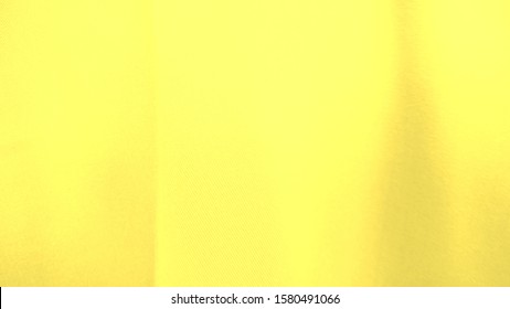 Smooth elegant Yellow silk or satin luxury cloth texture can use as wedding background. Luxurious background design