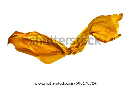 Smooth elegant yellow transparent cloth separated on white background. Texture of flying fabric.