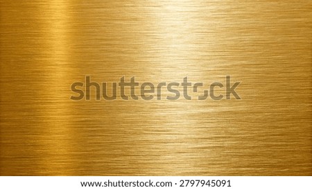Smooth golden metallic surface with subtle linear texture and warm reflective sheen.