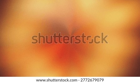 Smooth gradient blend of warm orange and pink hues in a soft abstract texture