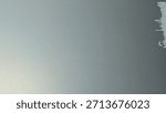 Smooth gradient surface transitions from light to dark tones, possibly metallic or matte in texture.