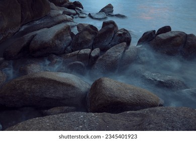 smooth and light waves between the rocks
