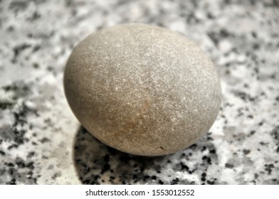 Smooth Round Stone Isolated Against Black Stock Photo 1553012552 ...