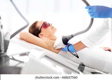 Smooth skin under the arms. Woman on laser hair removal - Shutterstock ID 468657560