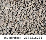 smooth stones of a dry river gravel bed fishi sawning grounds global warming