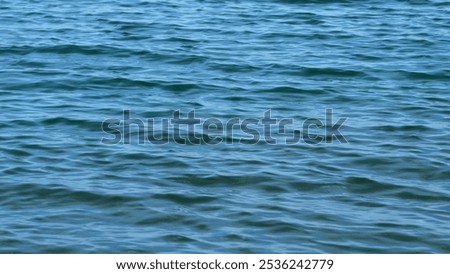 Smooth Swaying Of Waves. Beautiful And Fresh Blue Wavy Water. Calming Effect Of Water Movement. Close up.