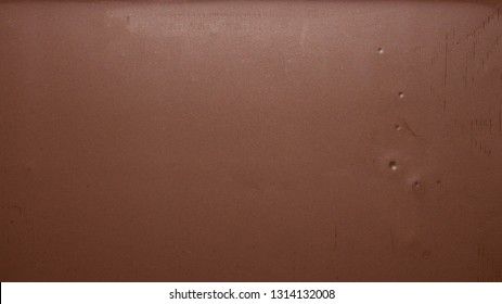 Smooth Texture Of Milk Chocolate.Chocolate Photo Background.