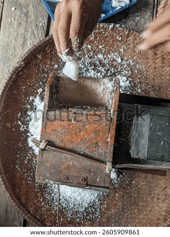A smoother coconut grater machine